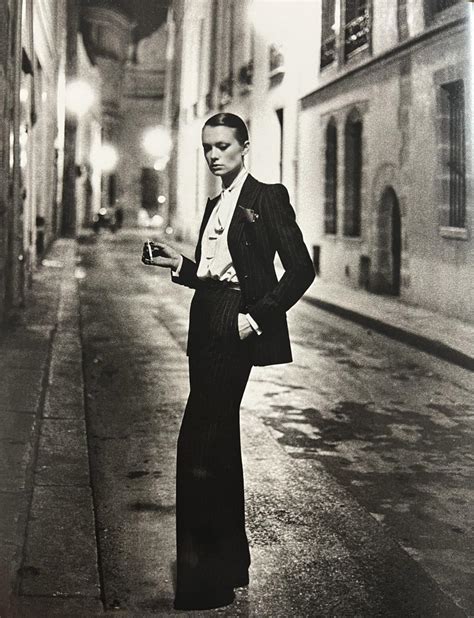 Rue Aubriot. Paris Collections 1975. The suit is by St. Laurent .